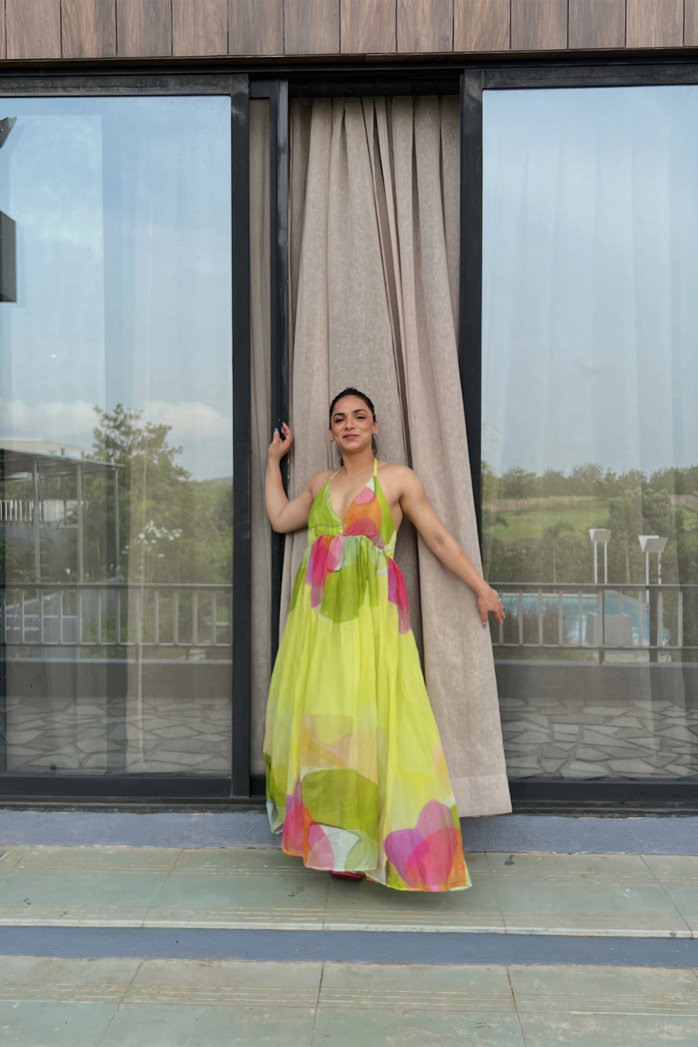 SHIVANI JHA In Green Printed Backless Halter Neck Maxi Dress