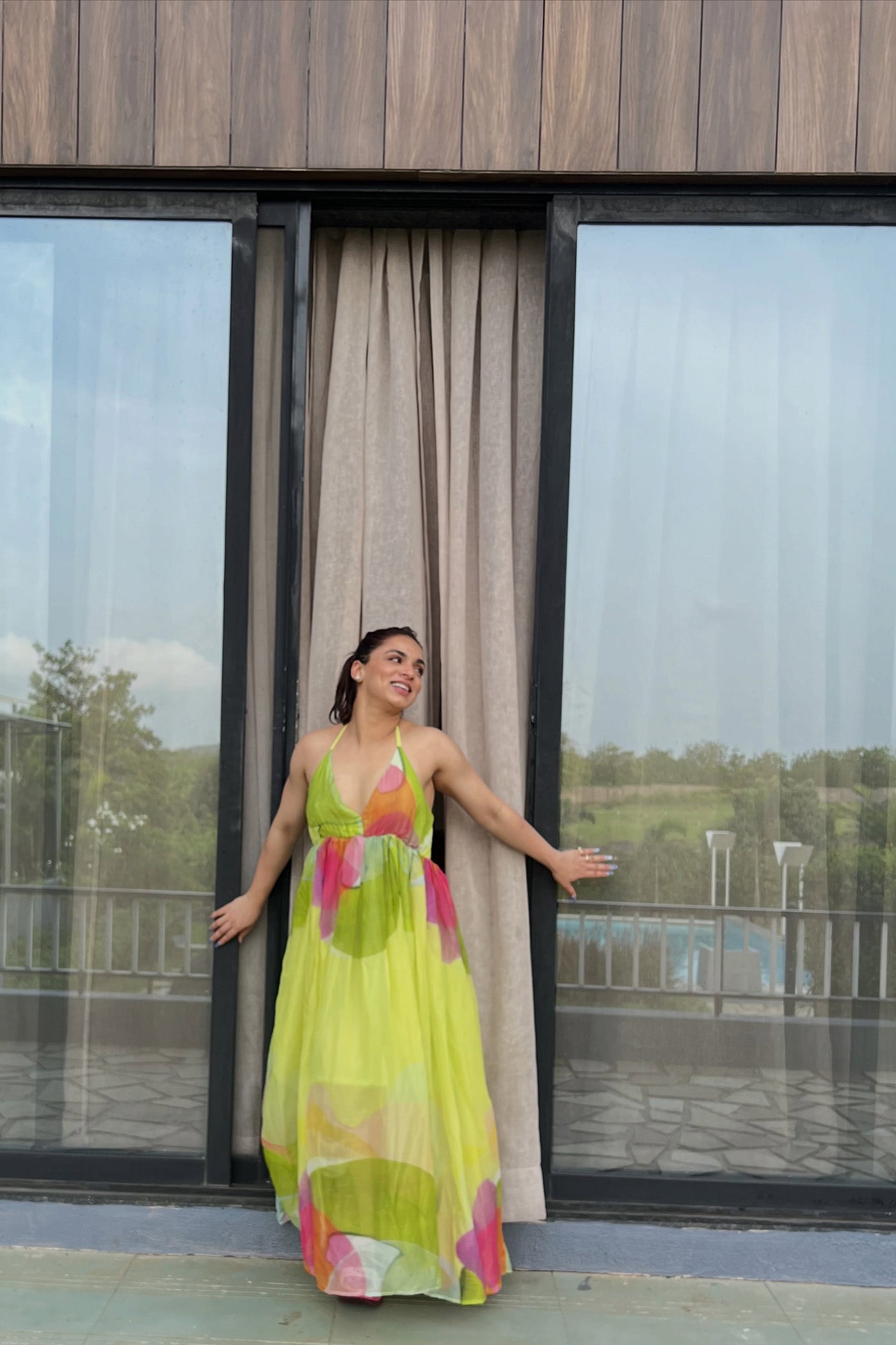 SHIVANI JHA In Green Printed Backless Halter Neck Maxi Dress