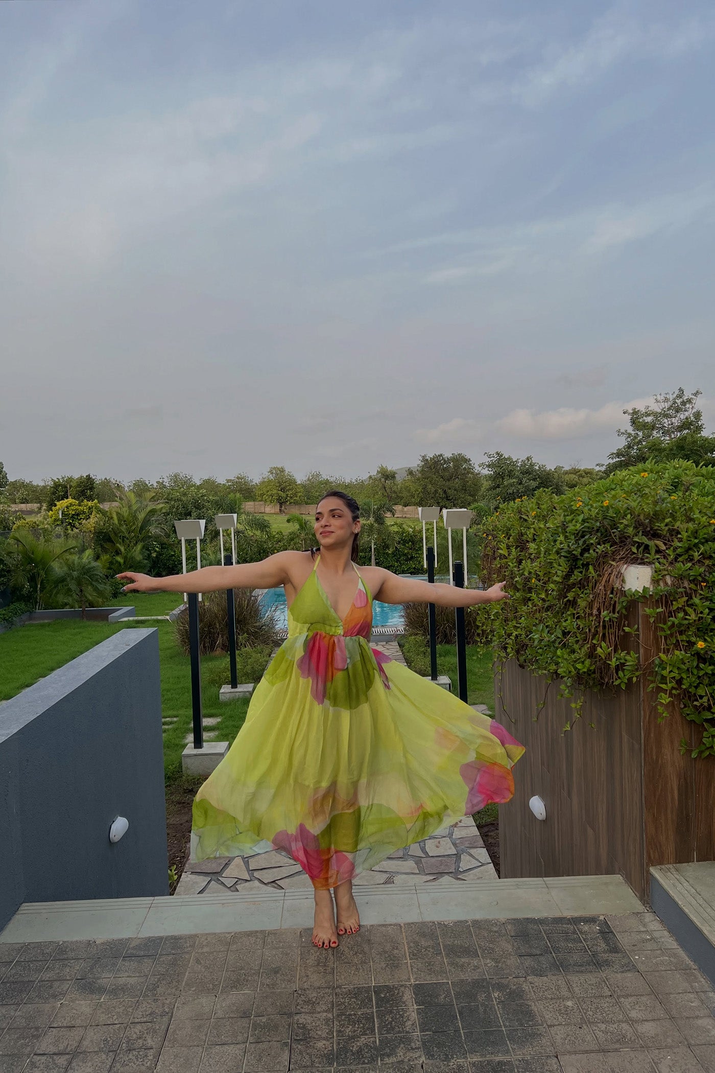 SHIVANI JHA In Green Printed Backless Halter Neck Maxi Dress