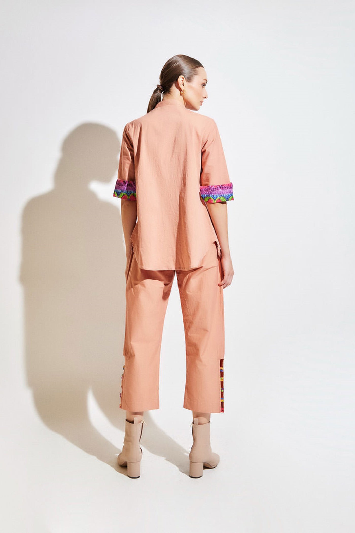 embroided top with facing sleeves