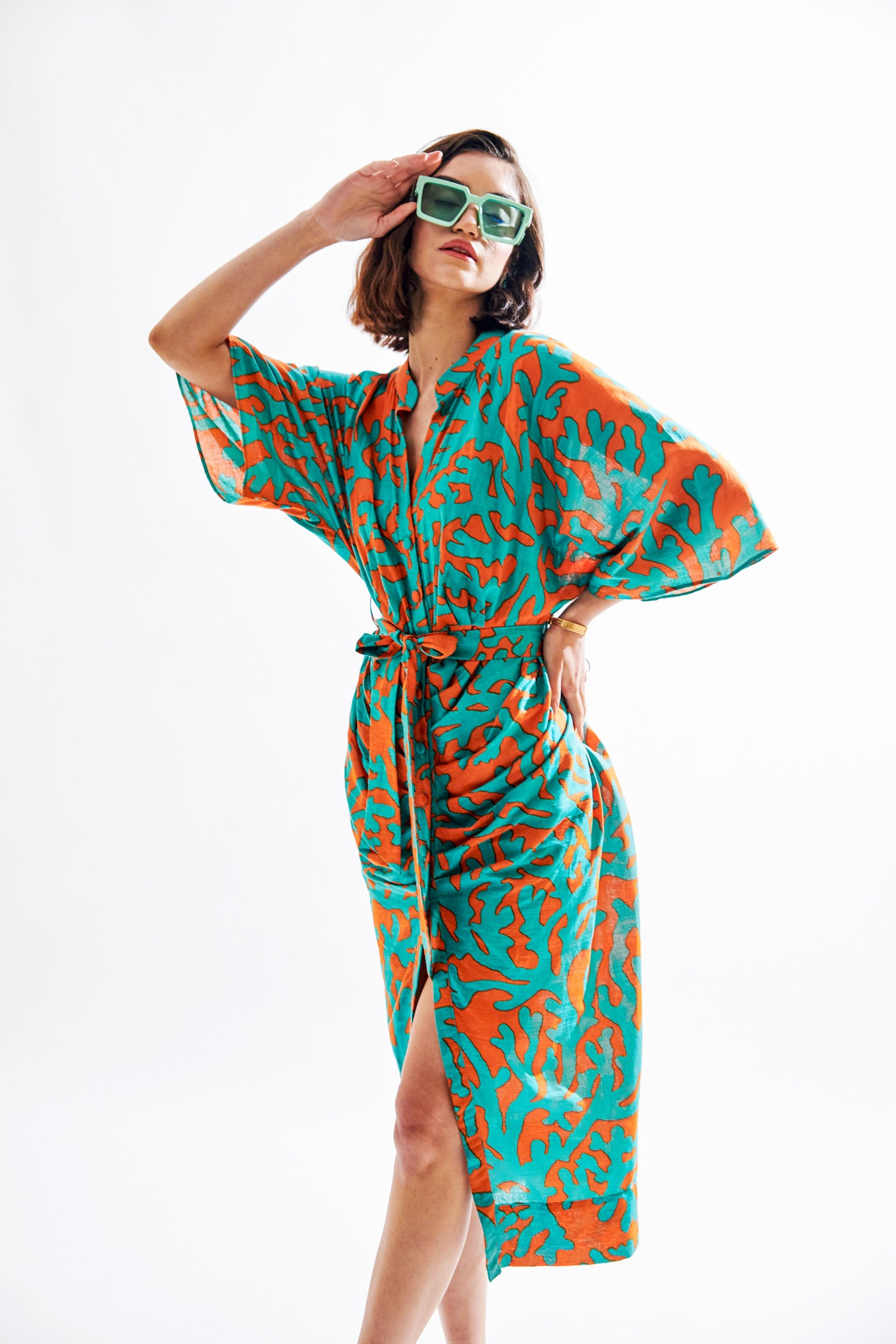 Krystle D'souz In teal green orange printed dress